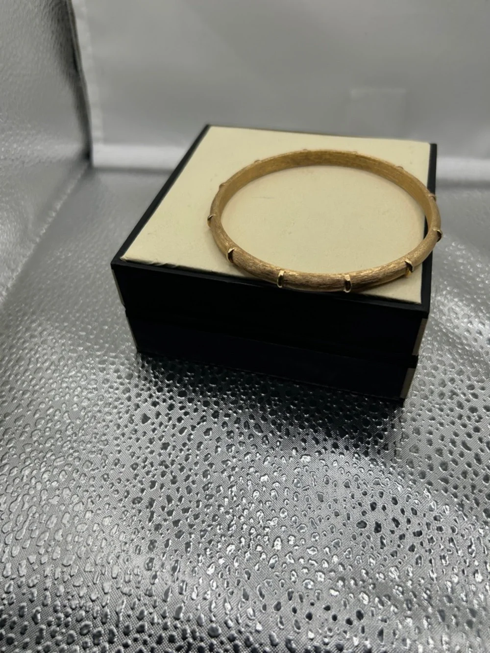 Vintage trifari bangle sleek gold tone brushed texture raised accents classic